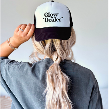 Glow dealer hat for spray tan artists 